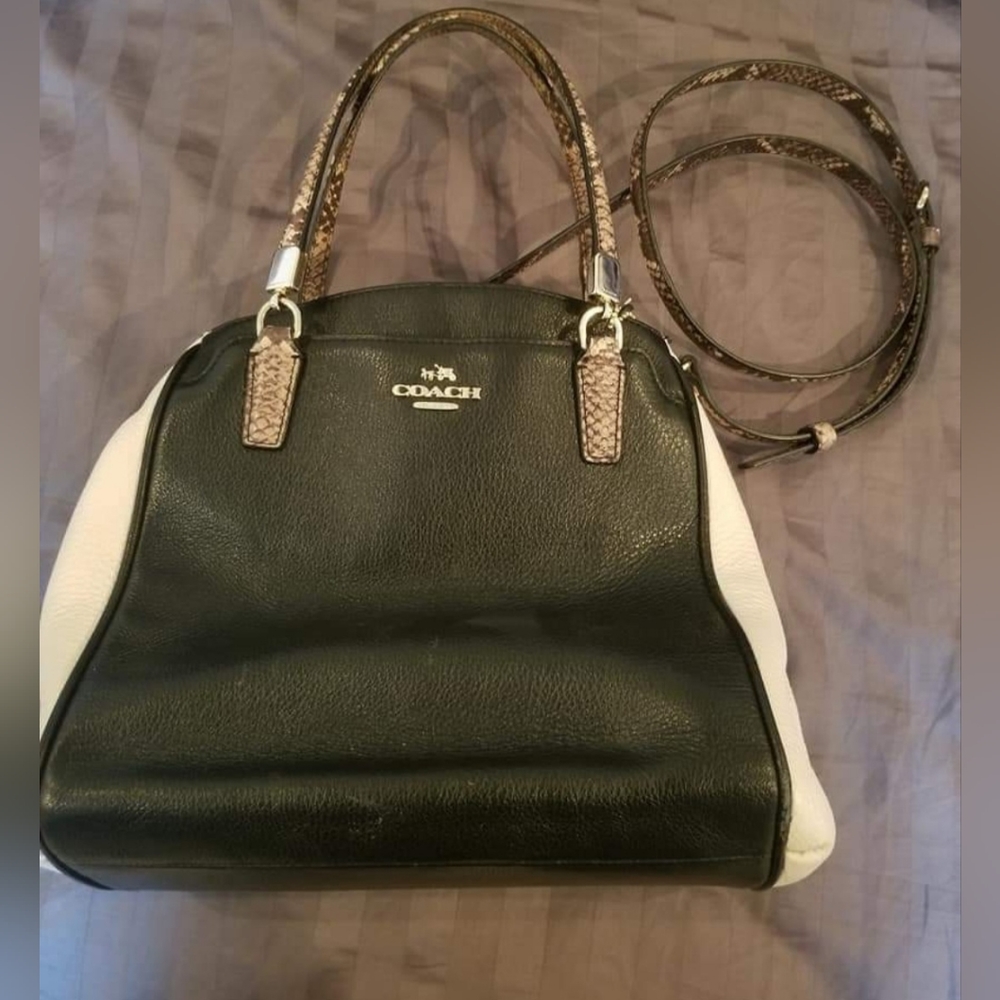 Black and white Coach bag with snake print accents